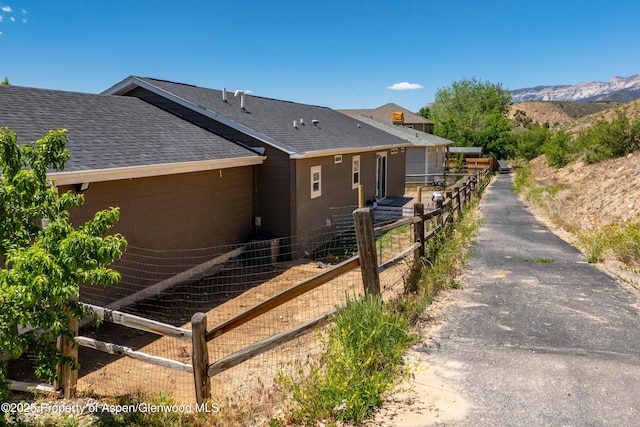 2432 Pioneer Way, Rifle, CO 81650 - view of front of house with roof with shingles and a mountain view