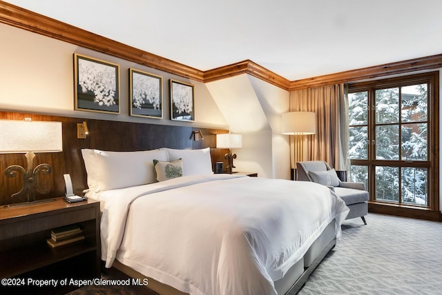 carpeted bedroom featuring ornamental molding