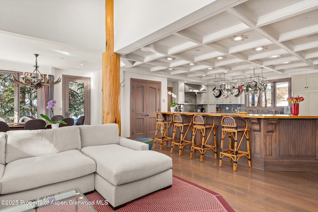 645 Willoughby Way, Aspen, CO 81611 - living area with a chandelier, wood finished floors, coffered ceiling, beam ceiling, and recessed lighting