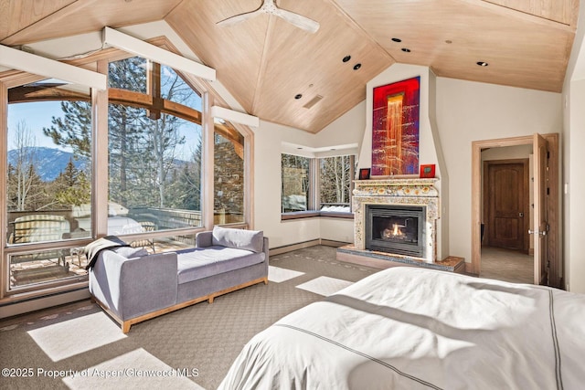 bedroom featuring wooden ceiling, baseboards, a fireplace, and high vaulted ceiling