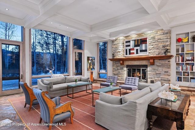 living room with recessed lighting, coffered ceiling, beamed ceiling, and a stone fireplace