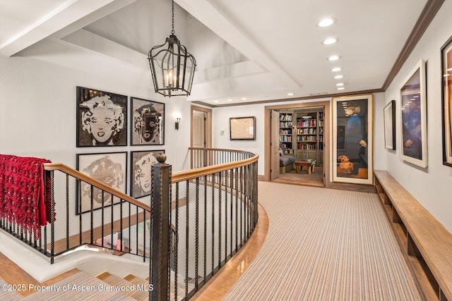 645 Willoughby Way, Aspen, CO 81611 - corridor featuring recessed lighting, an upstairs landing, a chandelier, built in features, and wood finished floors