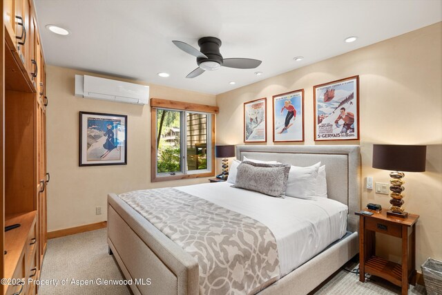 610 S W End St Unit D105, Aspen, CO 81611 - bedroom featuring a wall mounted AC, recessed lighting, baseboards, light carpet, and ceiling fan