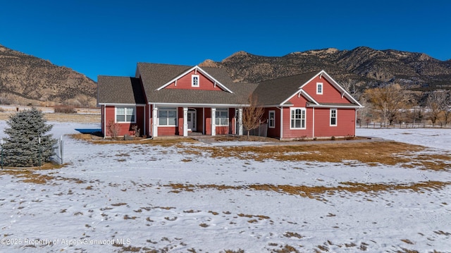 view of front of property with a mountain view