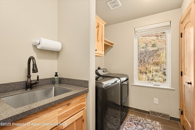 3900 County Road 3, Marble, CO 81623 - laundry area featuring sink, washer and clothes dryer, cabinets, and dark tile patterned floors