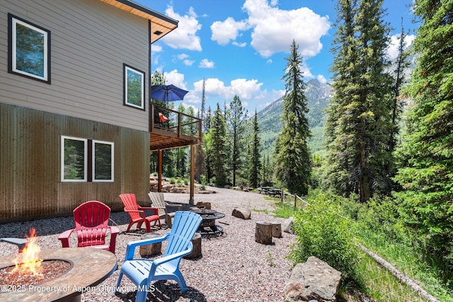 3900 County Road 3, Marble, CO 81623 - view of yard featuring a wooden deck and a fire pit