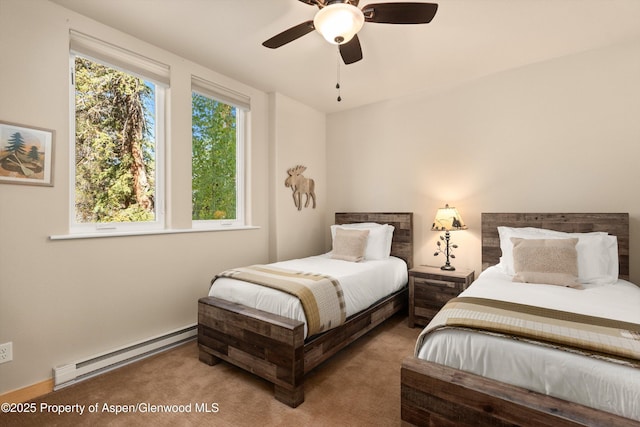 3900 County Road 3, Marble, CO 81623 - bedroom with a baseboard radiator, ceiling fan, and carpet
