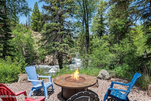 3900 County Road 3, Marble, CO 81623 - view of patio / terrace with a fire pit