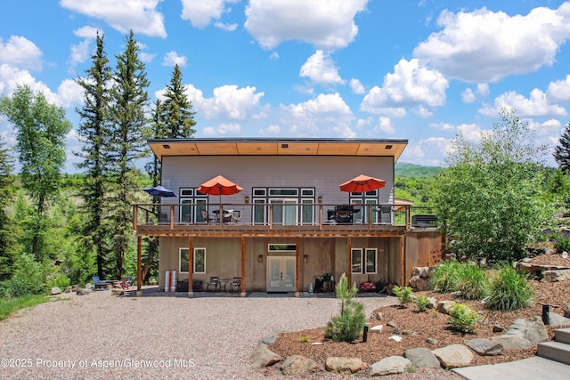 3900 County Road 3, Marble, CO 81623 - back of property with a deck and a patio area