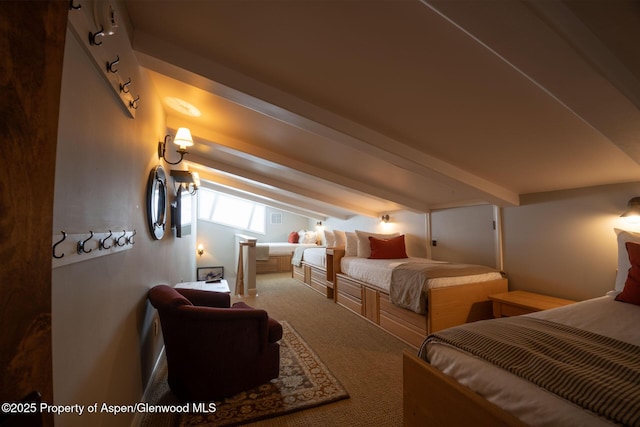 bedroom featuring beamed ceiling and carpet floors