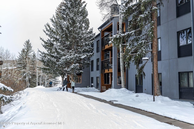 view of snow covered property