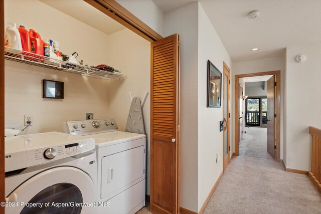 229 Faraway Rd # 34, Snowmass Village, CO 81615 - clothes washing area featuring separate washer and dryer and light colored carpet