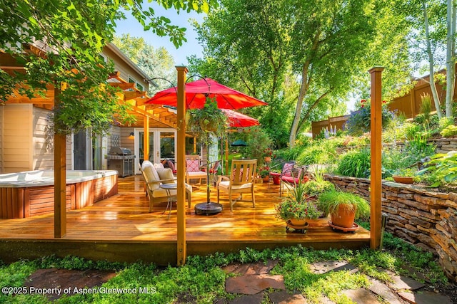 90 River Cv, Basalt, CO 81621 - wooden terrace with a hot tub and grilling area