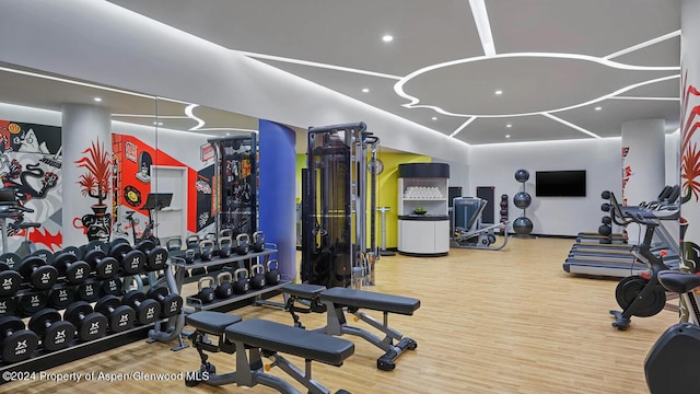 gym with hardwood / wood-style flooring