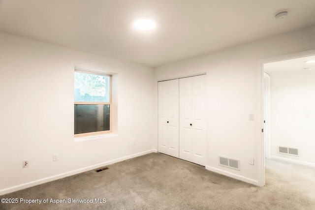 94 Castle Ridge Dr, New Castle, CO 81647 - unfurnished bedroom with carpet and a closet