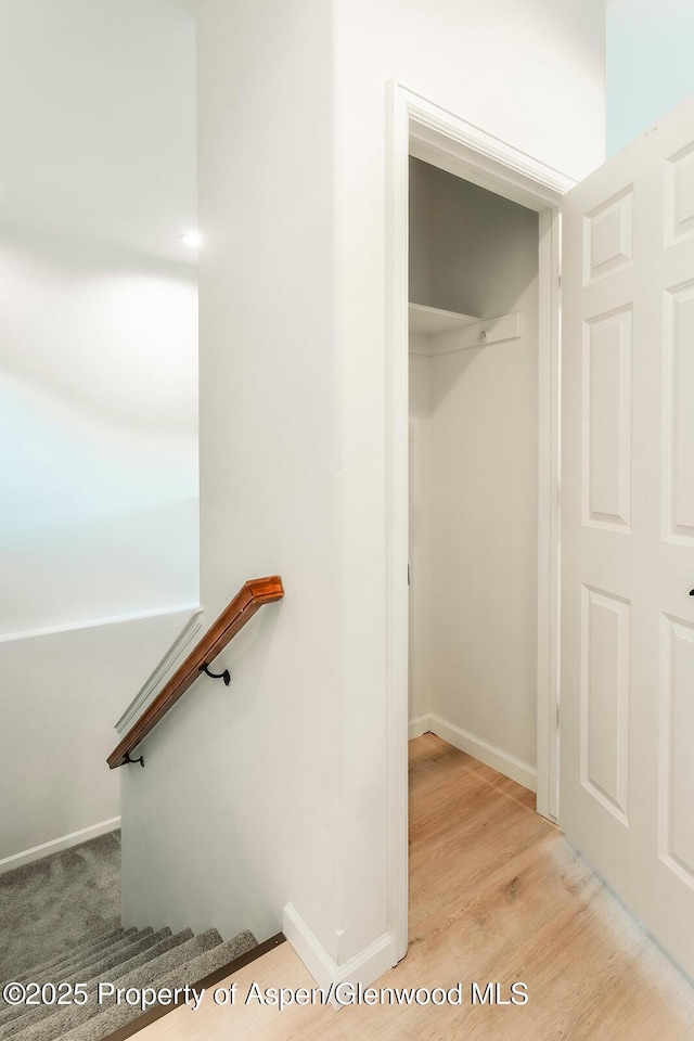94 Castle Ridge Dr, New Castle, CO 81647 - staircase featuring wood finished floors and baseboards