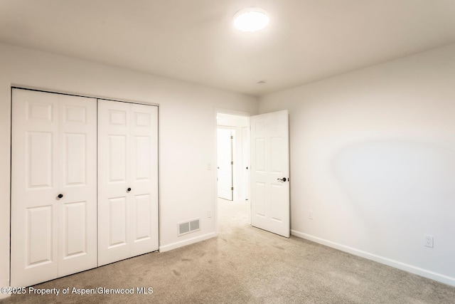 94 Castle Ridge Dr, New Castle, CO 81647 - unfurnished bedroom featuring carpet flooring and a closet