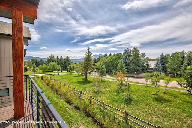 balcony featuring a mountain view and a rural view