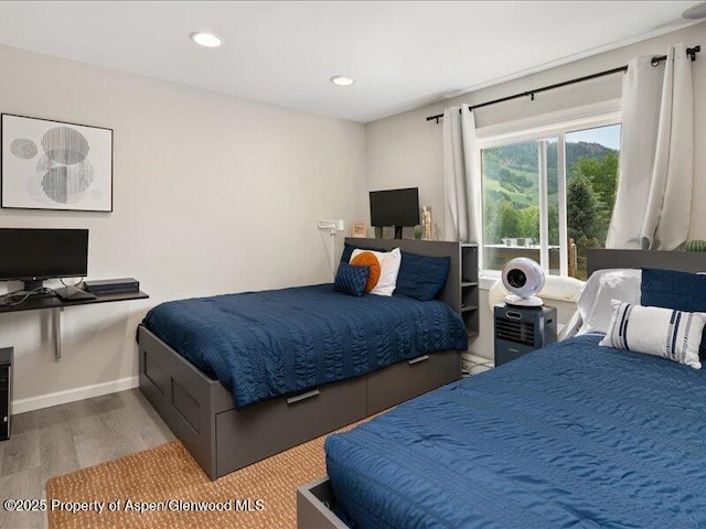326 Midland Ave Unit 302, Aspen, CO 81611 - bedroom featuring wood finished floors and recessed lighting