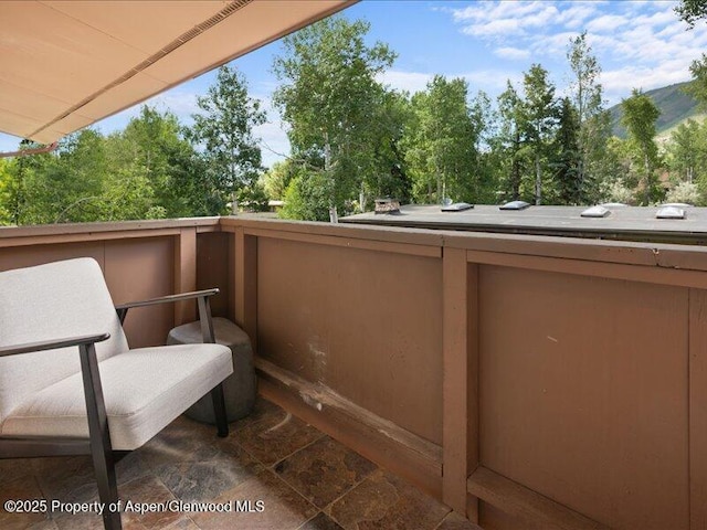 326 Midland Ave Unit 302, Aspen, CO 81611 - balcony featuring view of wooded area