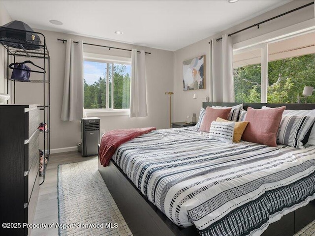 326 Midland Ave Unit 302, Aspen, CO 81611 - bedroom featuring light wood-style flooring and recessed lighting
