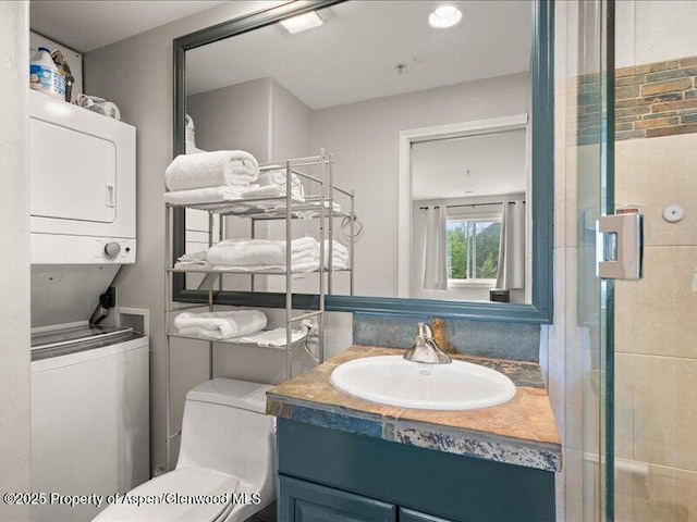 326 Midland Ave Unit 302, Aspen, CO 81611 - full bathroom featuring stacked washer / dryer and vanity