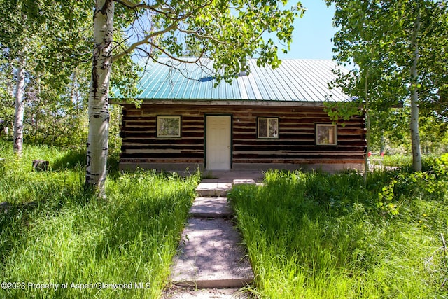 view of log-style house