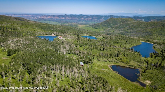 aerial view with a water and mountain view