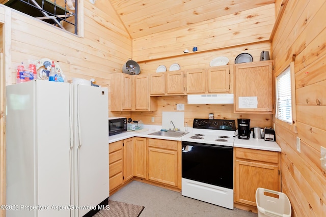 kitchen with wood walls, sink, exhaust hood, and white appliances