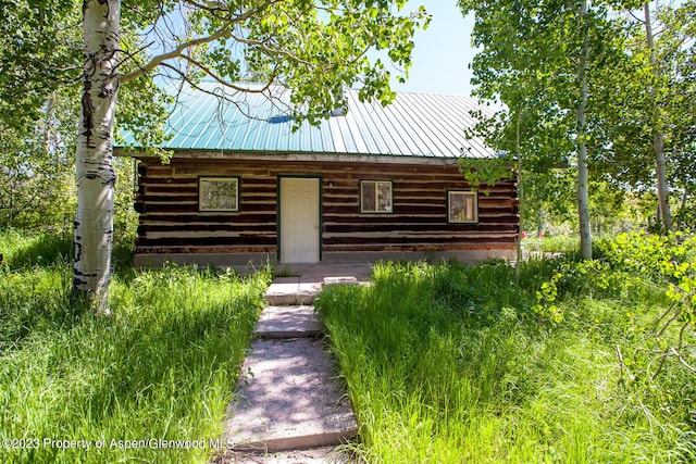 view of log-style house