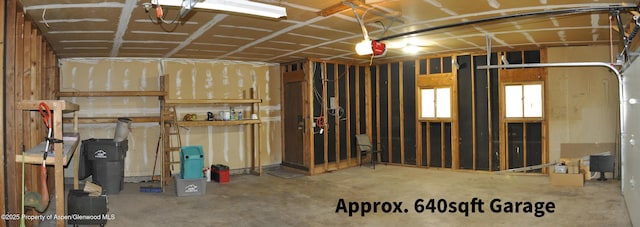 miscellaneous room featuring a garage and concrete flooring