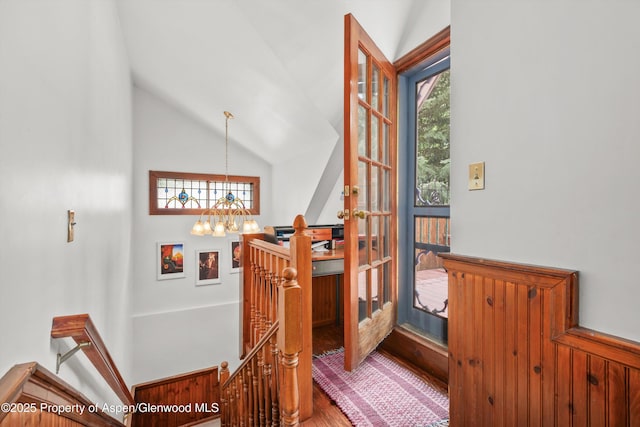 126 W Francis St, Aspen, CO 81611 - stairs with wood finished floors, a chandelier, and high vaulted ceiling