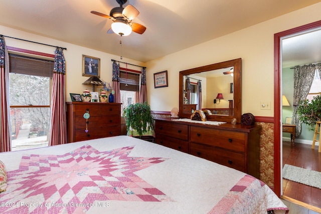 bedroom featuring wood-type flooring and ceiling fan