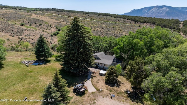 245 County Road 338, Parachute, CO 81635 - aerial view of property and surrounding area featuring a mountainous background