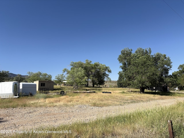 245 County Road 338, Parachute, CO 81635 - view of yard with a view of countryside