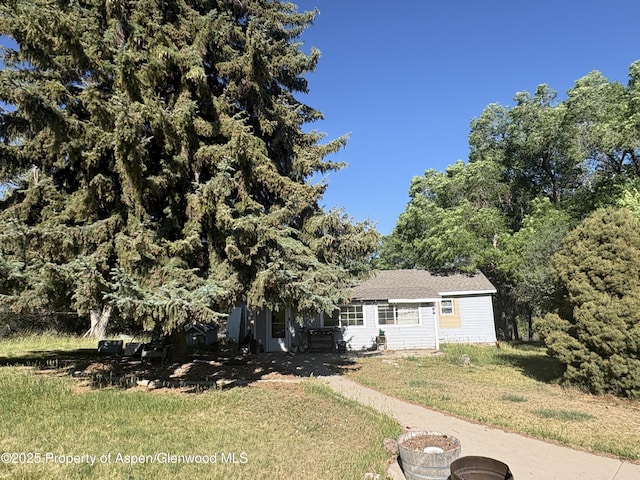 245 County Road 338, Parachute, CO 81635 - view of front of home featuring a front lawn