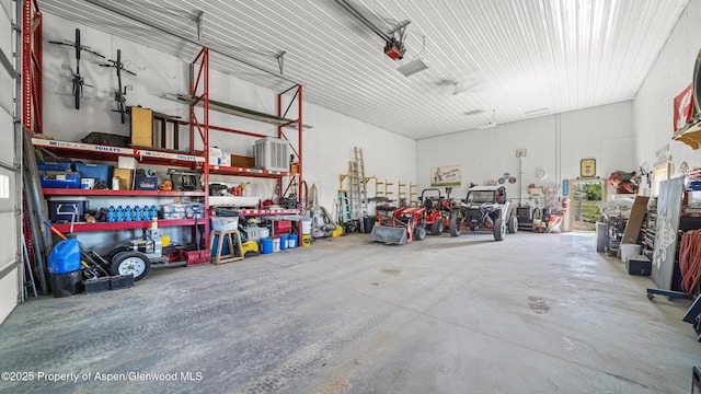 25 W 20th St, Craig, CO 81625 - garage with a workshop area and a garage door opener