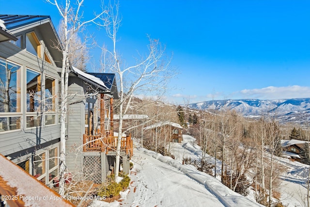 exterior space featuring a mountain view