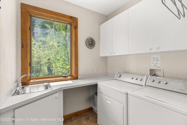 117 Deer Ln, Marble, CO 81623 - laundry area with cabinet space, separate washer and dryer, and dark stone finish floors