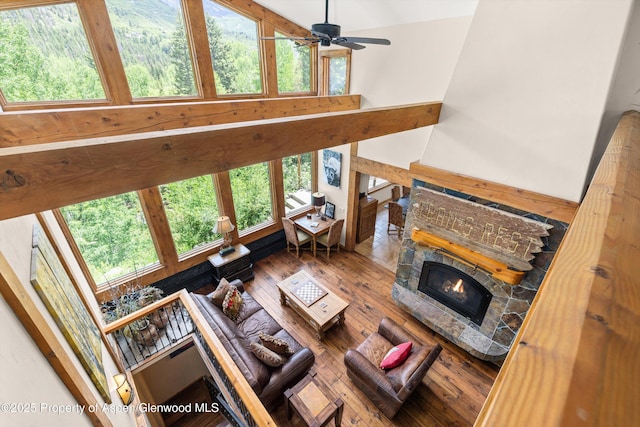117 Deer Ln, Marble, CO 81623 - living area featuring hardwood / wood-style flooring, ceiling fan, and a fireplace