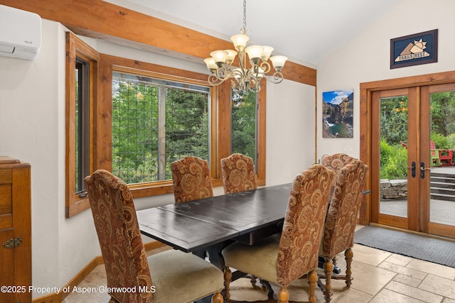117 Deer Ln, Marble, CO 81623 - dining room featuring lofted ceiling, a chandelier, french doors, stone tile flooring, and an AC wall unit