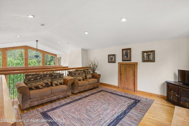 117 Deer Ln, Marble, CO 81623 - living area featuring wood finished floors, a ceiling fan, lofted ceiling, and recessed lighting