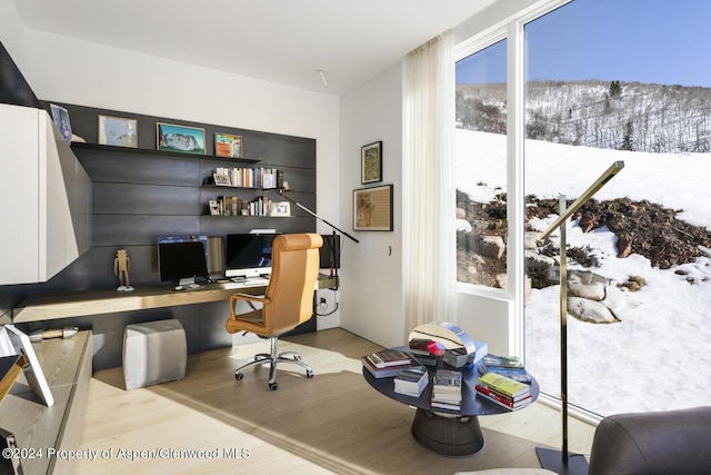 542 Carroll Dr, Aspen, CO 81611 - office area with built in study area and wood finished floors