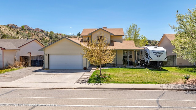 2086 Acacia Ave, Rifle, CO 81650 - view of front of property with concrete driveway and a garage
