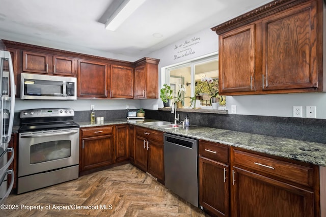 2086 Acacia Ave, Rifle, CO 81650 - kitchen featuring appliances with stainless steel finishes and dark stone counters
