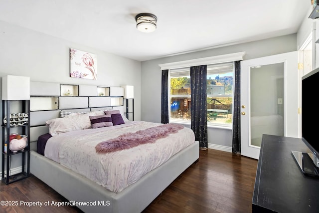 2086 Acacia Ave, Rifle, CO 81650 - bedroom featuring dark wood-style floors and baseboards