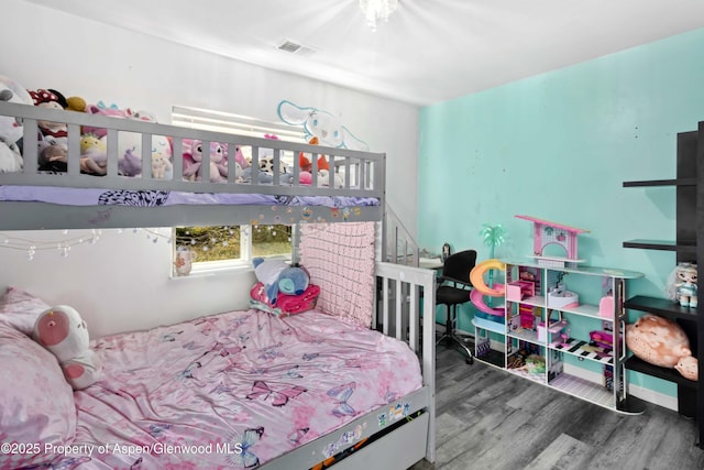 2086 Acacia Ave, Rifle, CO 81650 - bedroom featuring wood finished floors and baseboards