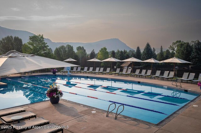 589 Saddleback Rd, Carbondale, CO 81623 - community pool featuring a mountain view and a patio