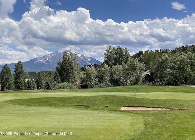 589 Saddleback Rd, Carbondale, CO 81623 - surrounding community featuring a mountain view, view of golf course, and a lawn