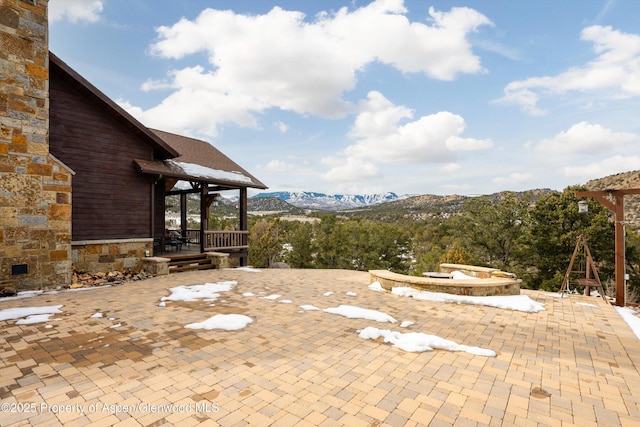 view of patio with a mountain view